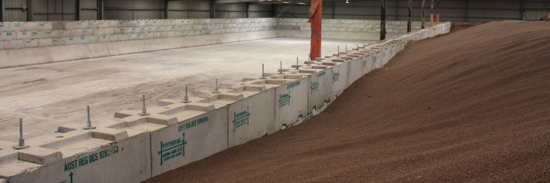 Interbloc concrete blocks forming a large fertiliser bin for Viterra