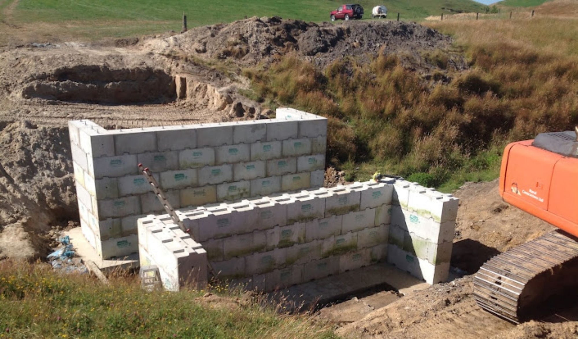 Midway point of construction for an Interbloc concrete block culvert
