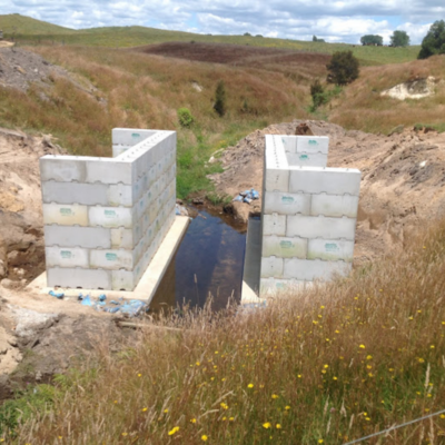 Front view of a completed culvert made from Interbloc concrete blocks