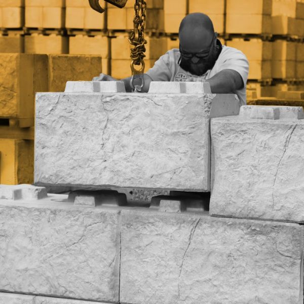 Stonebloc Accredited Contractor Placing an 800 standard Stonebloc Concrete Block 